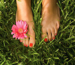 feet in grass